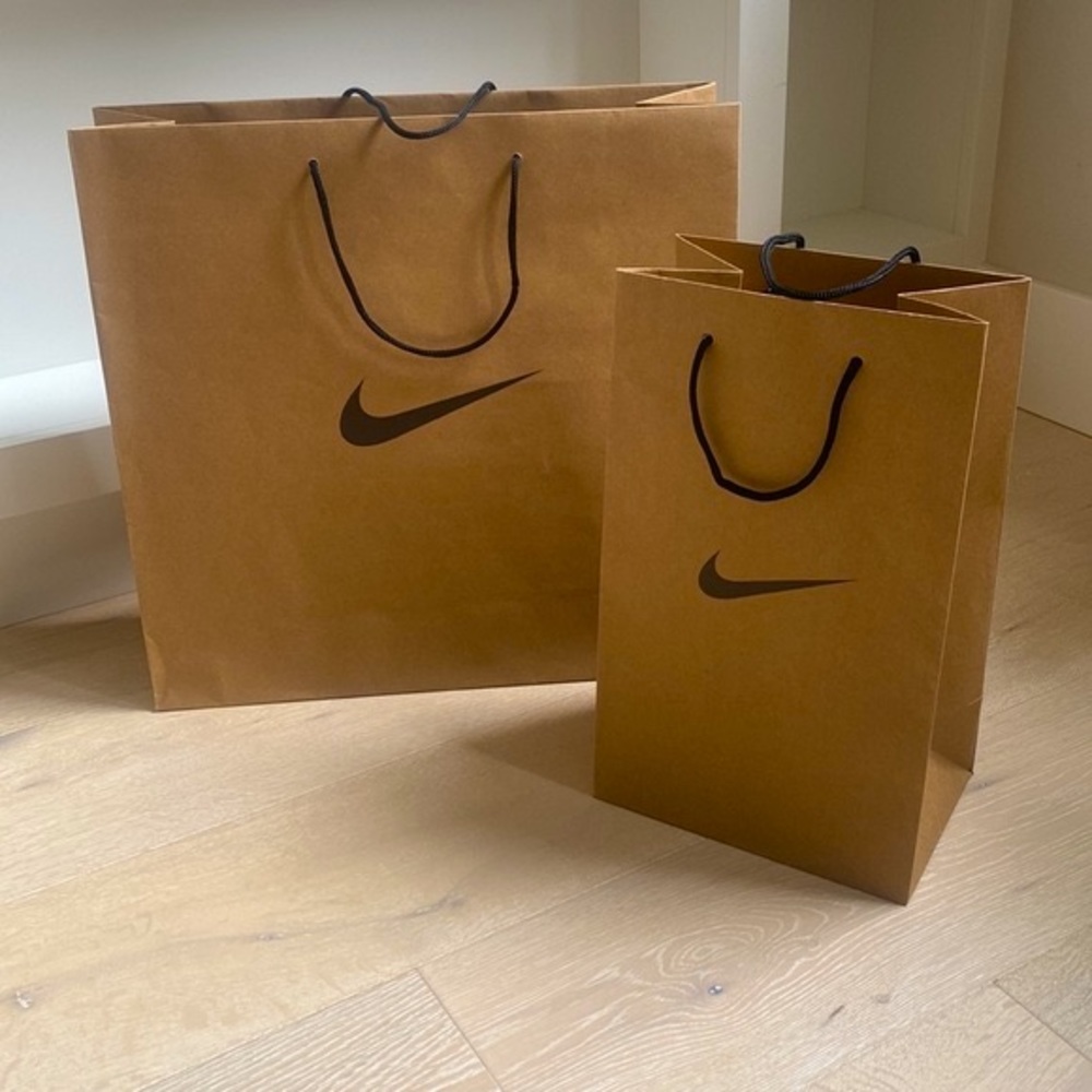 Set of 2 Nike reusable paper shopping bags: one large and one shoebox size